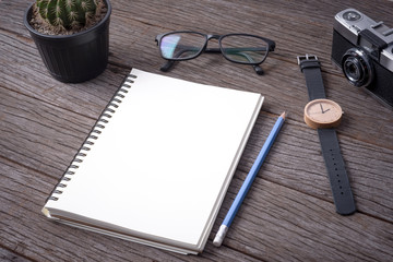 Notebook on wood background
