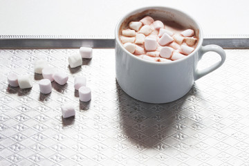 Mug filled with hot chocolate and marshmallow