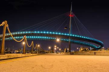 PESCARA, ITALY - The "Ponte del Mare" monumental bridge, in the canal and port of Pescara city, Abruzzo region