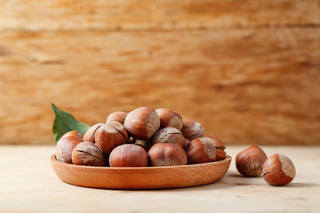 hazelnuts in wooden plate