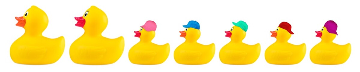 bath duck family with cool kids with colorful baseball caps isolated on white backgorund