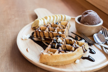 delicious sweet dessert : homemade waffle with chocolate sauce