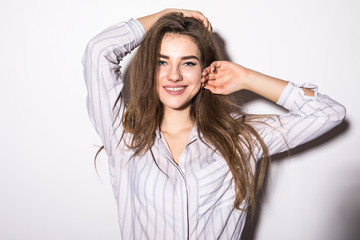 Beautiful young girl. Studio shot on white background