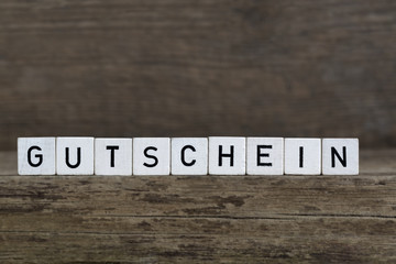 German word voucher, written in cubes