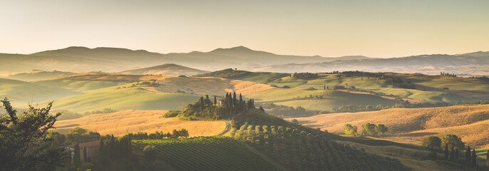 Scenic Tuscany landscape panorama at sunrise, Val d'Orcia, Italy