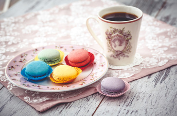 macaroon and coffe on table with napkin