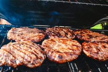 Cooking hamburgers on the grill