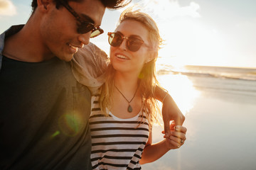 Beautiful woman with her boyfriend on the beach © Jacob Lund
