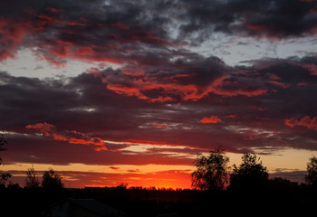 Crimson bloody sunset in Moscow in the autumn evening, Russia
