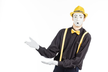 Portrait of a man, an artist, a pantomime. Shows something, isolated on white background