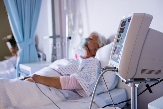 Vital Signs Monitor With Senior Patient