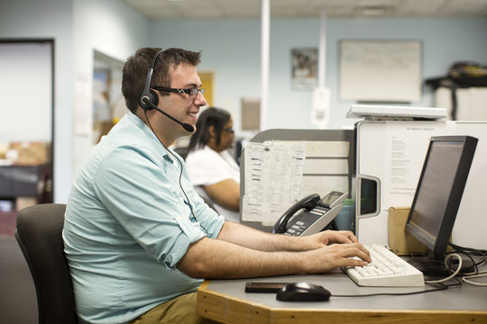Portrait of man working on computer in office