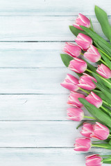 Easter background with pink tulips