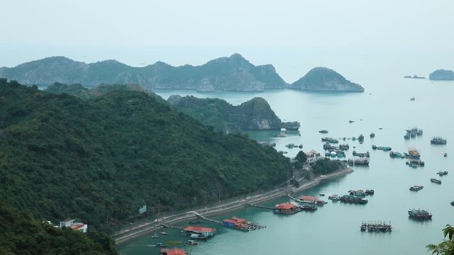Pan View of Ha Long Bay from the observation deck, Vietnam. Ha Long Bay is a UNESCO World Heritage Site and popular travel destination. Full HD stock footage. 

