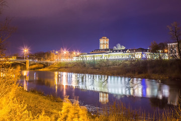 Night landscape of the city with a view of the river and the bridge. Vologda. Russia