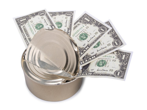 Several paper dollars in a tin can on a white background