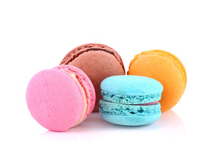 French colorful macarons isolated on white