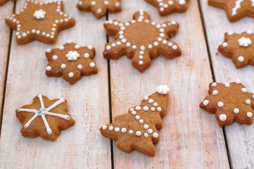 Gingerbread christmas cookies on wooden background