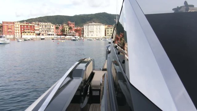 Detail of the windshield of a rubber boat docked in Sestri Levante bay, Italy.