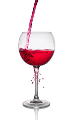 Splash of a red wine in glass