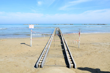 wooden pier on the beach 