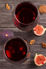 Glasses of red wine with grape. Wine and food still life. View from above, top studio shot