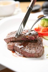 beef sirloin steak with fork