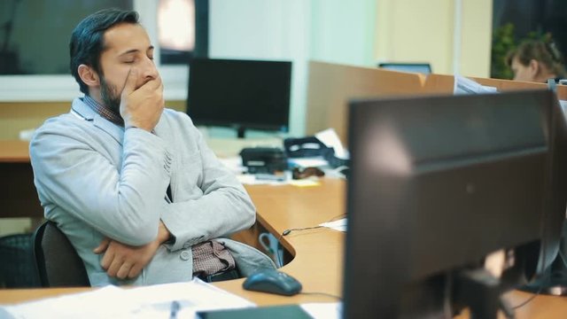 Man sleeping at work