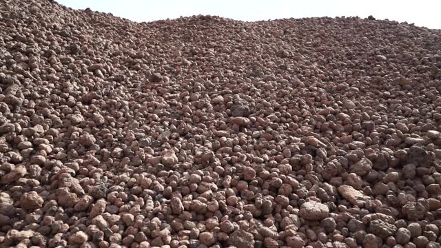 Claydite is a lightweight porous building material obtained by firing clay or shale.