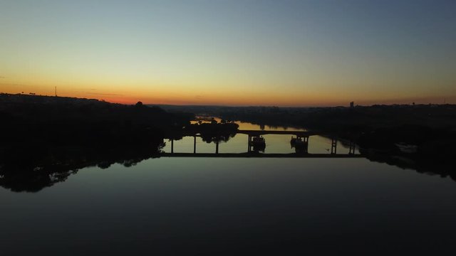 Aerial footage River at sunset in Barra Bonita city in Sao Paulo state - Brazil. July, 2016.