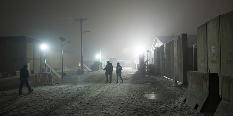 Nightly walk to chow hall on Afghanistan military installation during snow