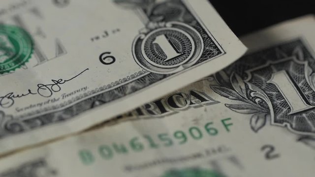 Close up image of a united states dollar isolated on black background