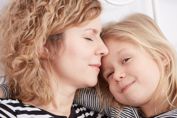 Daughter hugging her mom