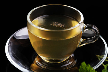 Herbal dry sri lanka tea. Mint leaf. Tea in a glass cup, mint leaves, dried tea, in a restaurant or teahouse