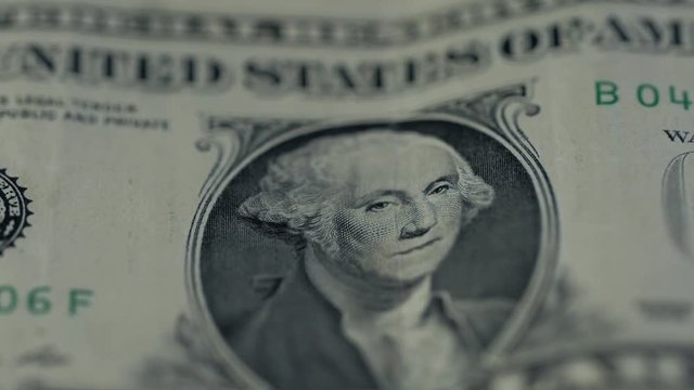 Close up image of a united states dollar isolated on black background