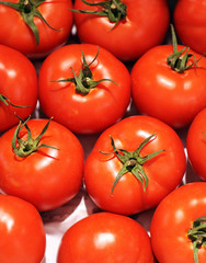 Red tomatoes on the market