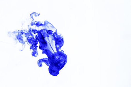 blurred blue ink in water