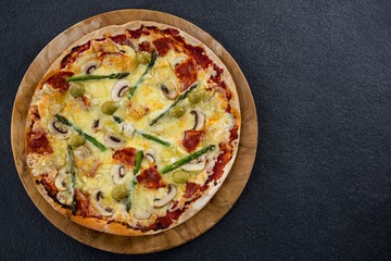 Italian pizza served in a pizza tray
