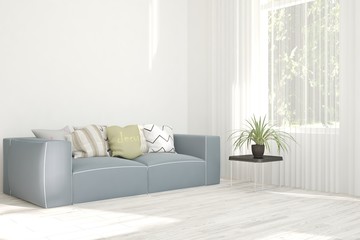 White room with sofa and green landscape in window. Scandinavian interior design. 3D illustration