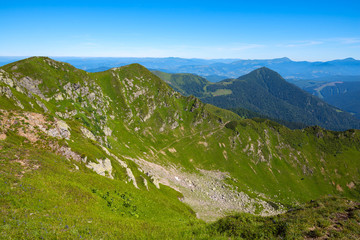 Fototapeta na wymiar Route leading along the rocky slopes of the mountains