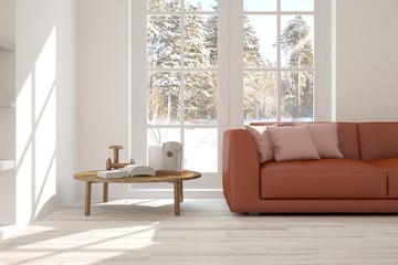Fototapeta premium White room with sofa and winter landscape in window. Scandinavian interior design. 3D illustration