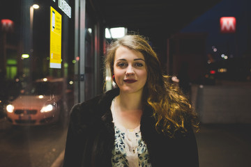 Portrait of young beautiful caucaisan long brown hair woman looking at camera, smiling - serene, carefree, skin care concept