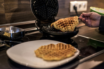 Baking Homemade waffles cooked in a waffle iron