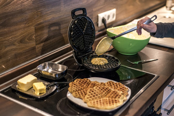 Baking Homemade waffles cooked in a waffle iron