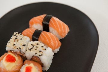 Maki, uramaki and nigiri sushi served plate 