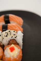 Maki, uramaki and nigiri sushi served in plate 