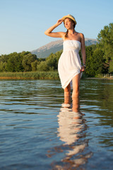 Woman standing in water