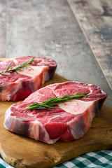 Raw meat on wooden background
