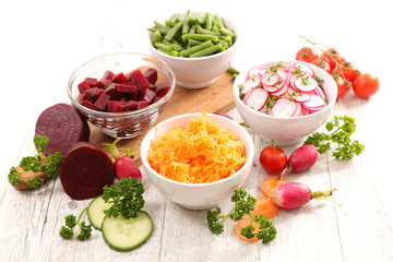 assorted vegetable salad and ingredients