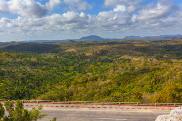 Fototapeta na wymiar Tropical island. Landscape. Road.Bacunayagua Bridge. Yumuri Valley. Matanzas